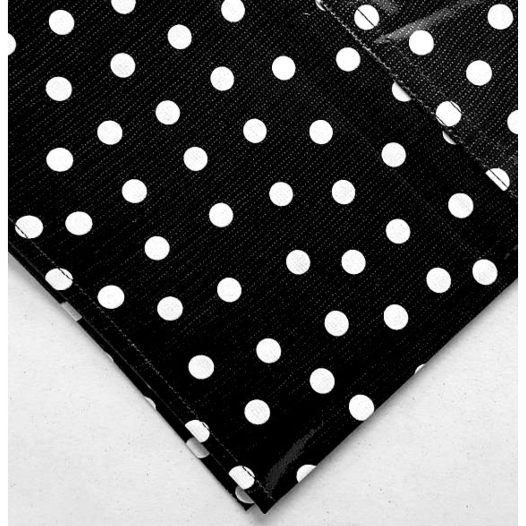 square or rectangular white dot on black oilcloth tablecloth with a hem
