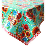 bloom aqua oilcloth tablecloth with red gingham trim