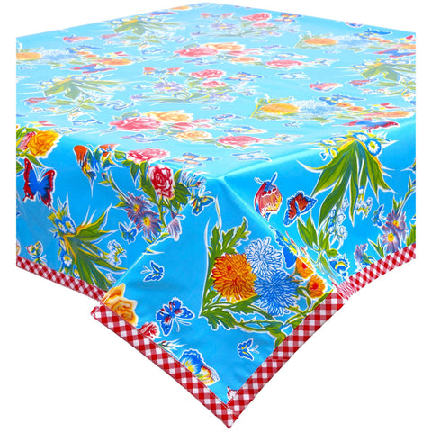 edgar's butterfyl light blue oilcloth tablecloth with red gingham trim