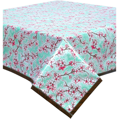 cherry blossom aqua oilcloth tablecloth with faux bois trim