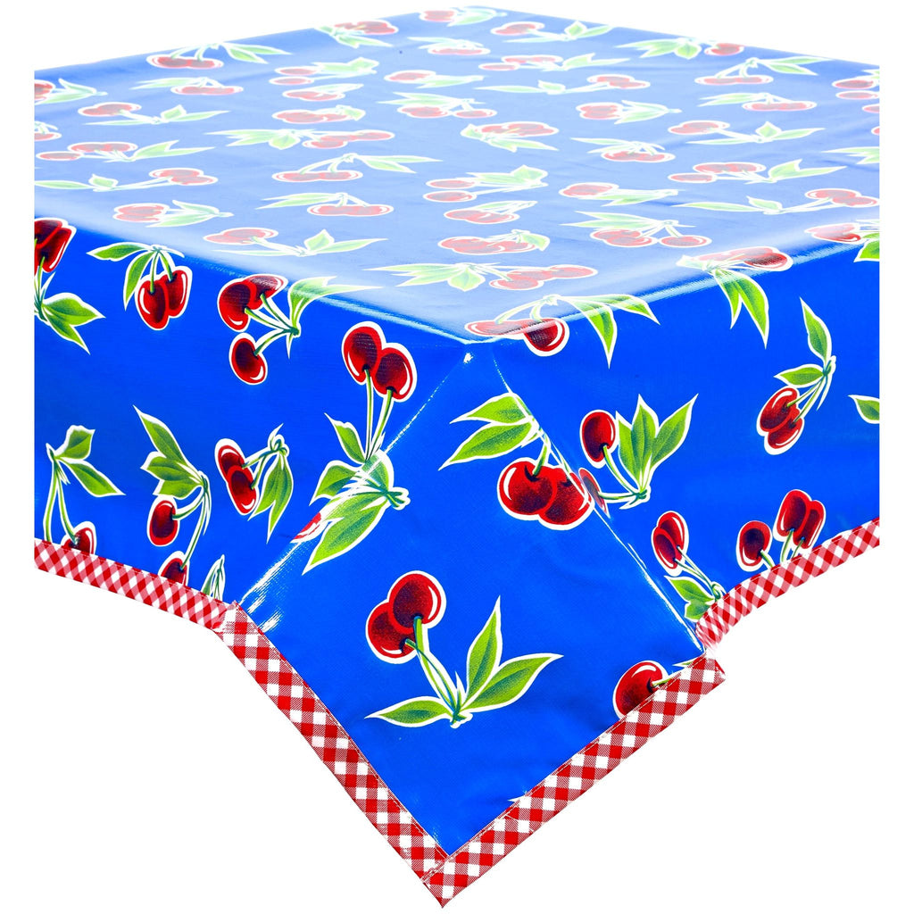 cherry blue oilcloth tablecloth with red gingham trim