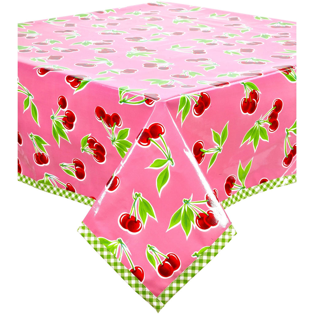 cherry pink oilcloth tablecloth with lime green gingham trim