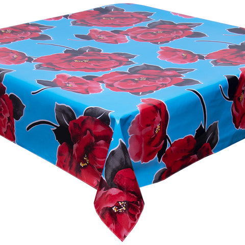 Freckled Sage Gardenias on Light Blue Tablecloth