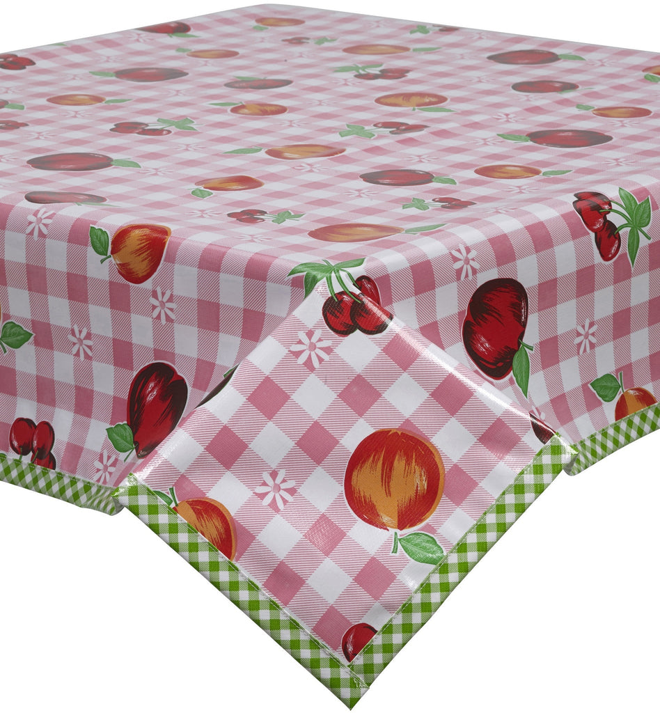 Freckled Sage Oilcloth Tablecloths in Fruit and Gingham Pink with lime gingham trim