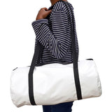 freckled sage oilcloth duffel bag on model