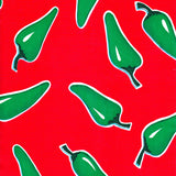 freckled sage jalapenos on red oilcloth swatch