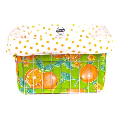 oilcloth bike basket liner in oranges lime green