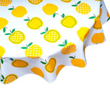 round apples and dots yellow oilcloth tablecloth close up
