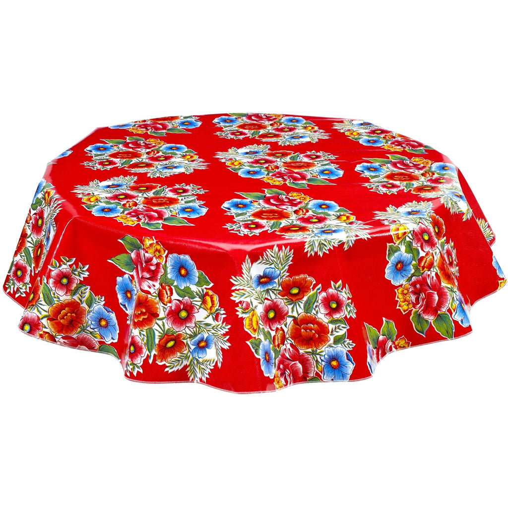 round flowers on red oilcloth tablecloth