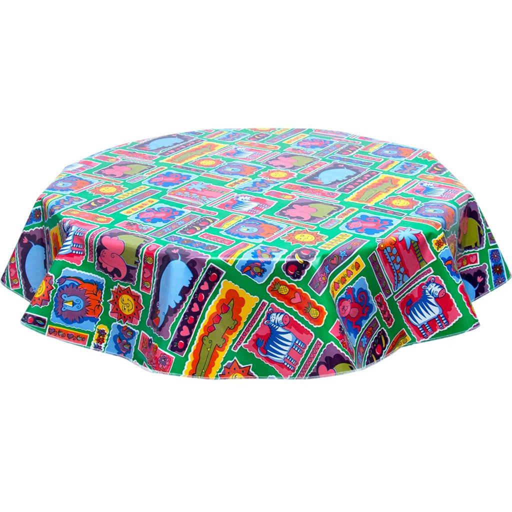 freckled sage round menagerie green oilcloth tablecloth