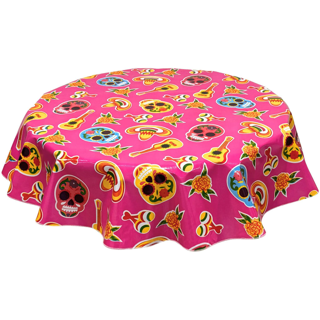 freckled sage round skulls on pink oilcloth tablecloth