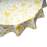 round chelsea on gold oilcloth tablecloths close up