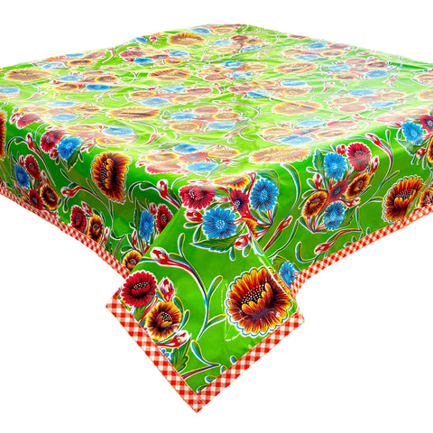 bloom lime green oilcloth tablecloth with orange gingham trim 