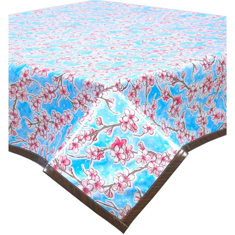 cherry blossom light blue oilcloth tablecloth with faux bois trim