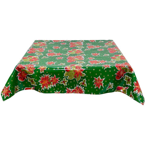 freckled sage christmas stars green oilcloth tablecloth with a simple hem
