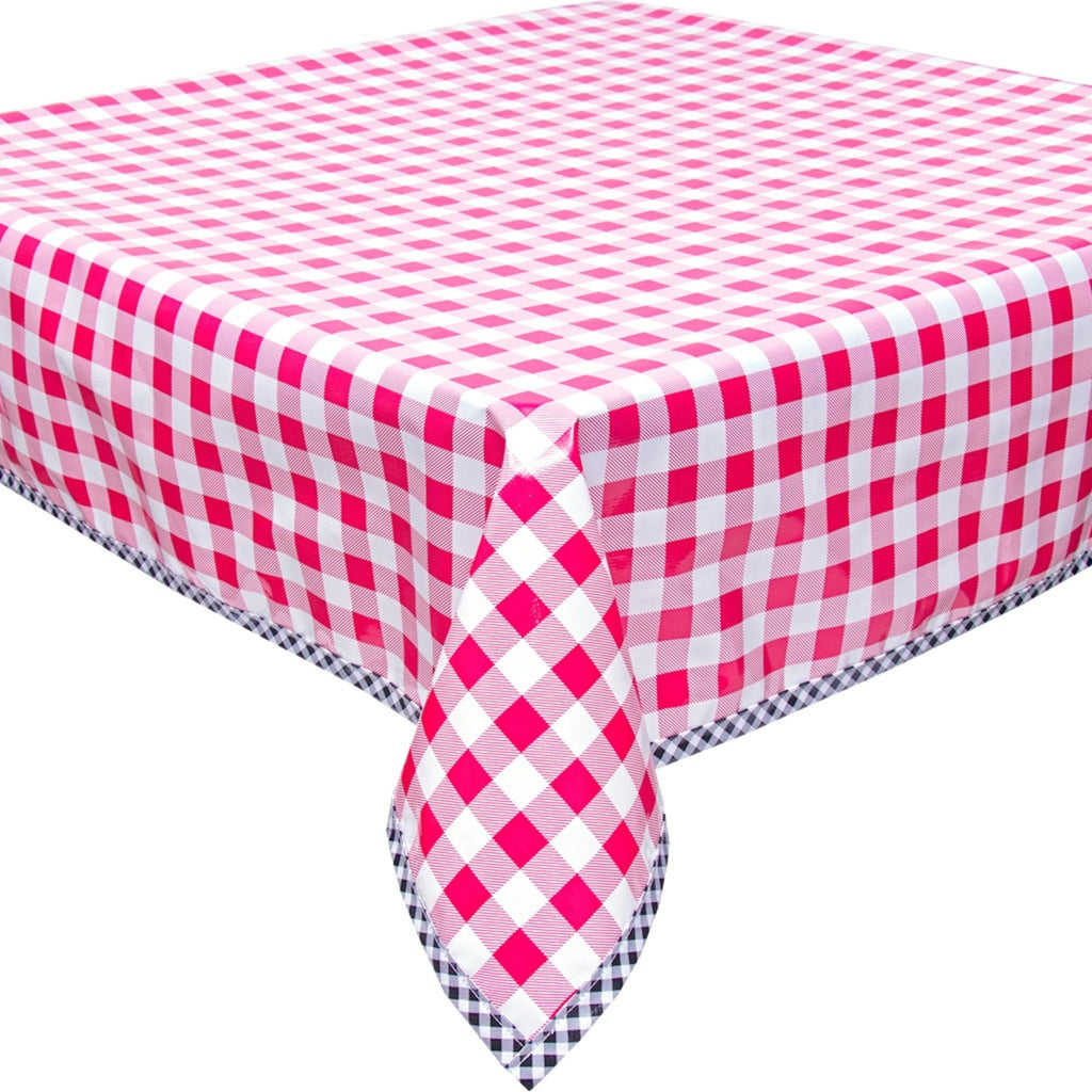 large gingham pink oilcloth tablecloth with black gingham trim