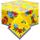 lemons and roses yellow oilcloth swatch with navy blue gingham trim