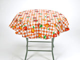 freckled sage round tablecloth orange fruit and gingham