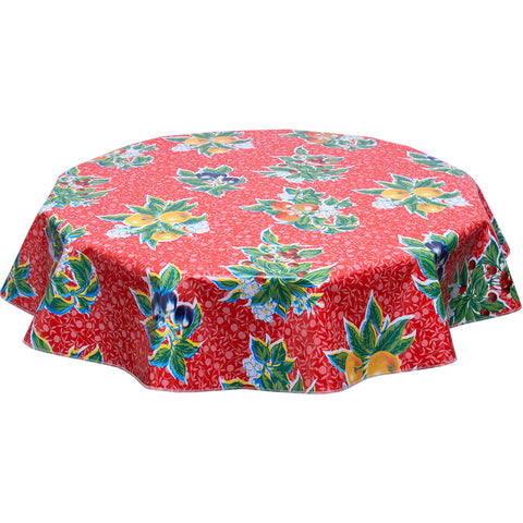 Round oilcloth tablecloth plums on red