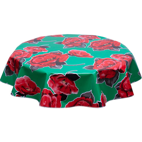 Round oilcloth tablecloth gardenias on green