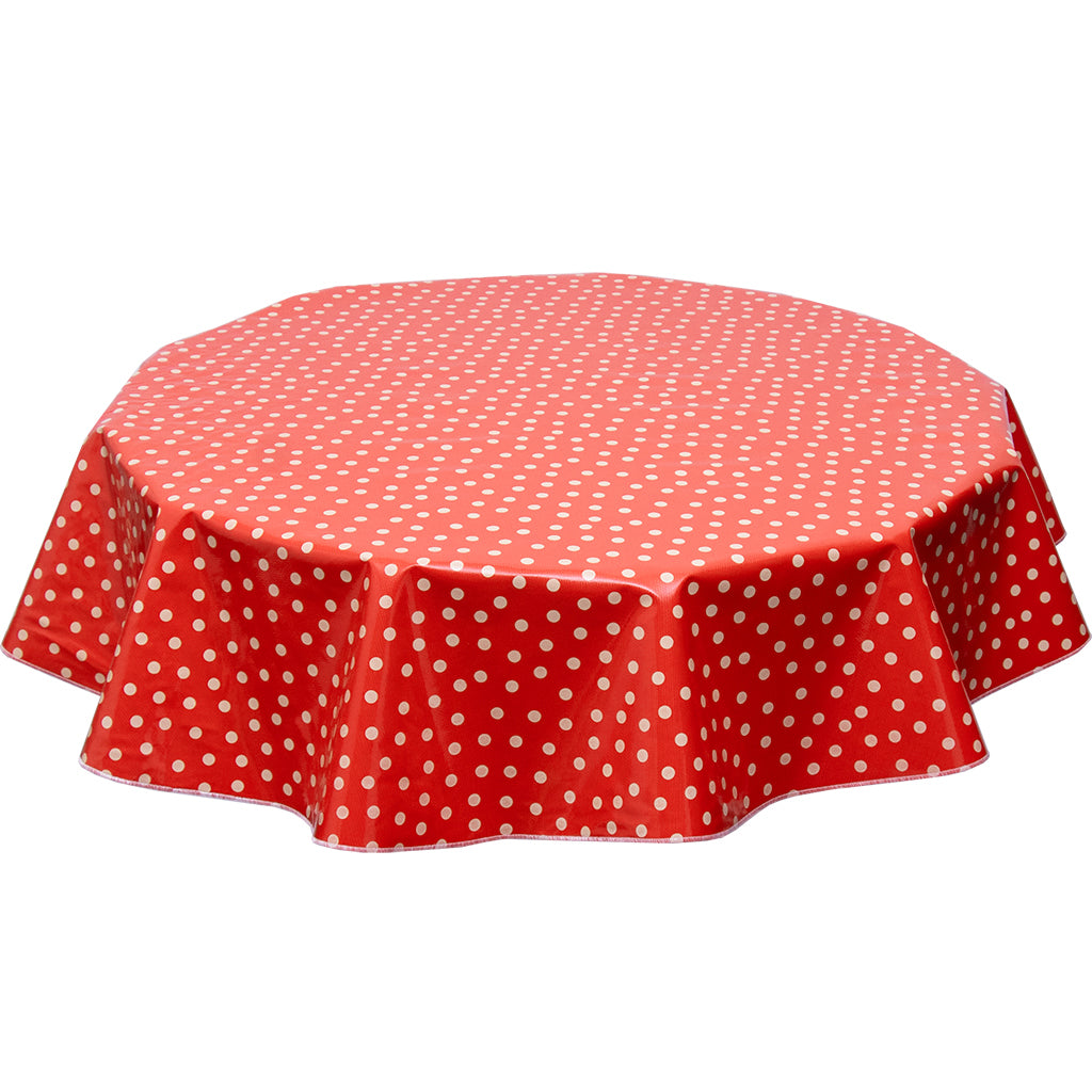 freckled sage round oilcloth tablecloth in tan dot one solid red