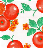 Round Oilcloth Tablecloth in Oranges on White