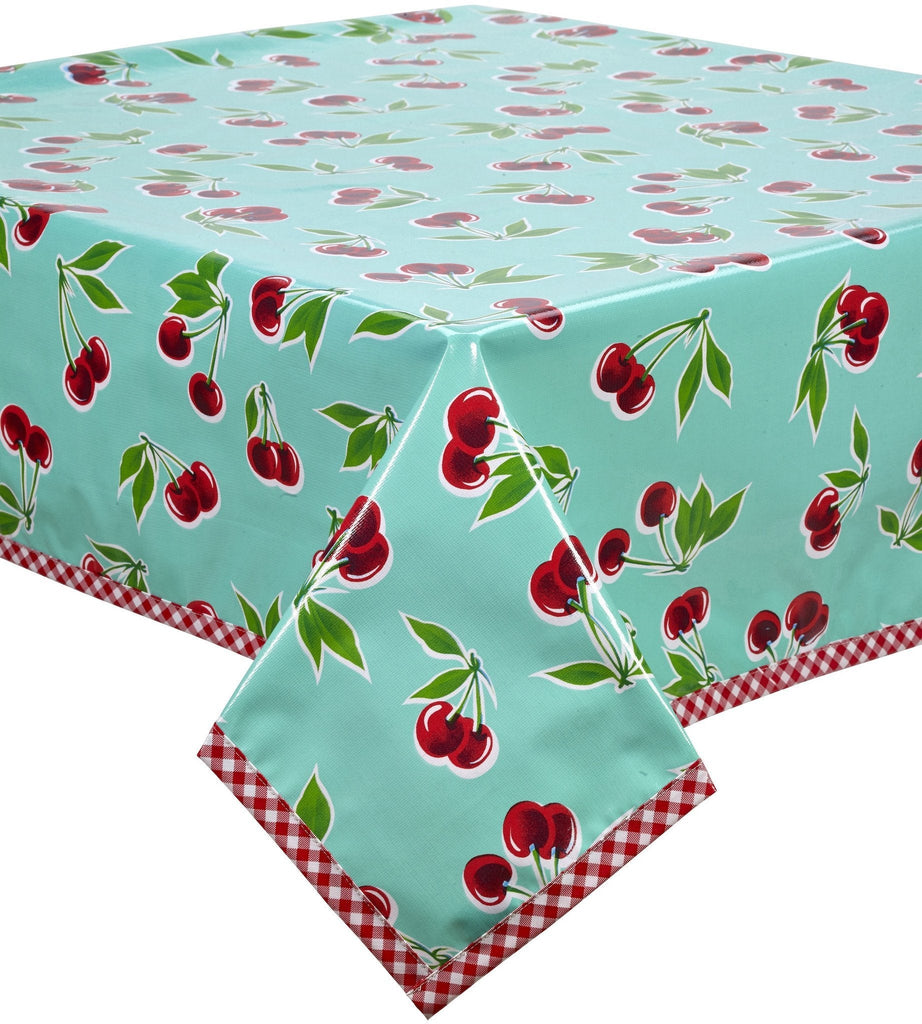 Freckled Sage Oilcloth Tablecloth Cherries on  Aqua with red gingham trim