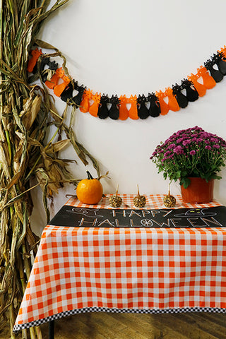 Freckled Sage Oilcloth Tablecloth Orange Buffalo Check