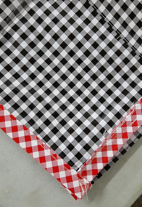Freckled Sage Oilcloth Tablecloth Black Gingham with red gingham trim